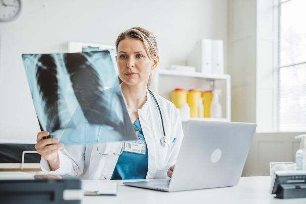 Doctor reviewing an x-ray image